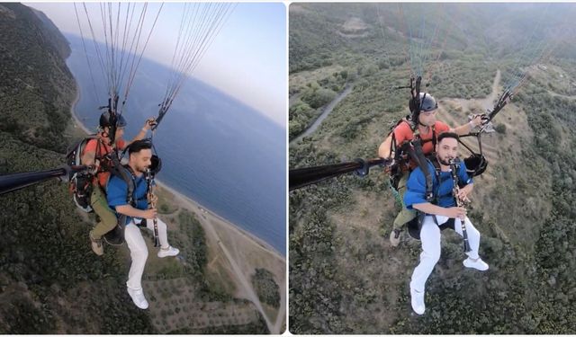Yamaç paraşütüyle uçarken klarnet çaldı
